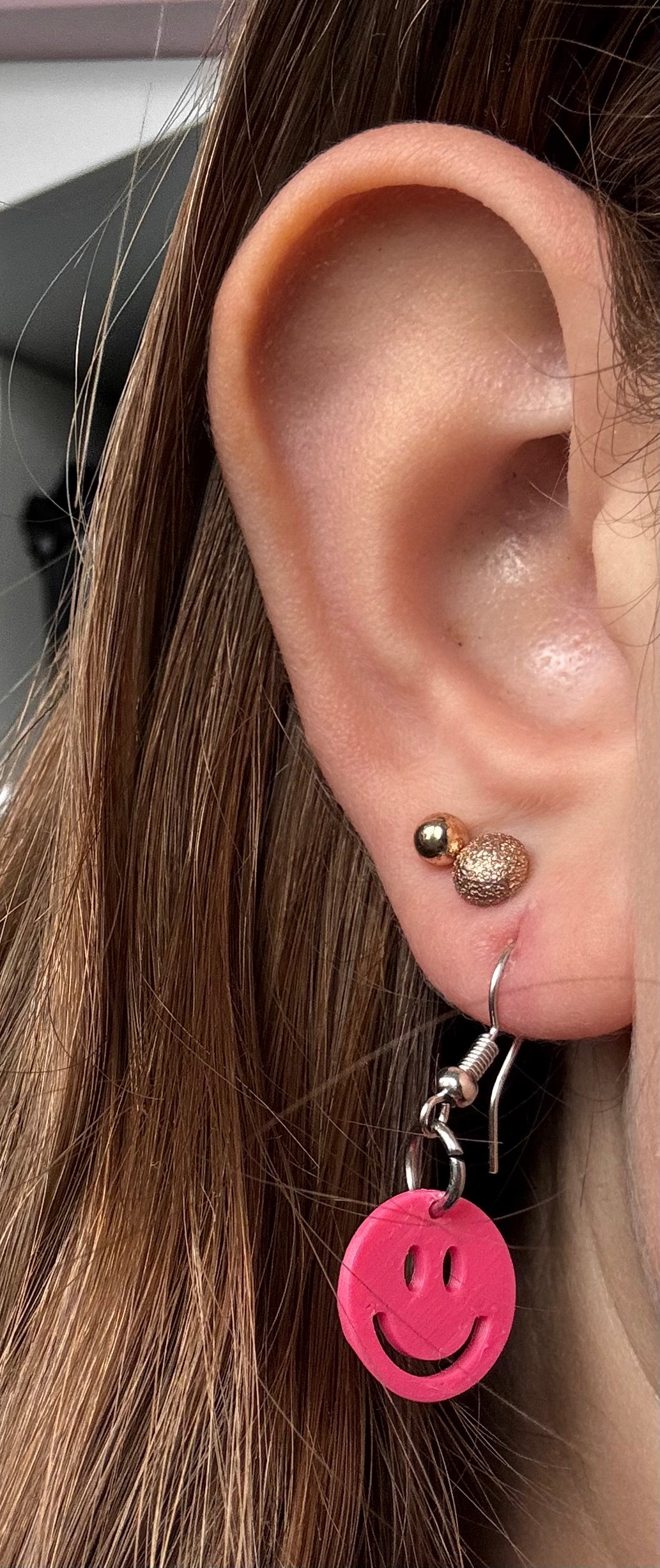 Smiley oorbellen roze